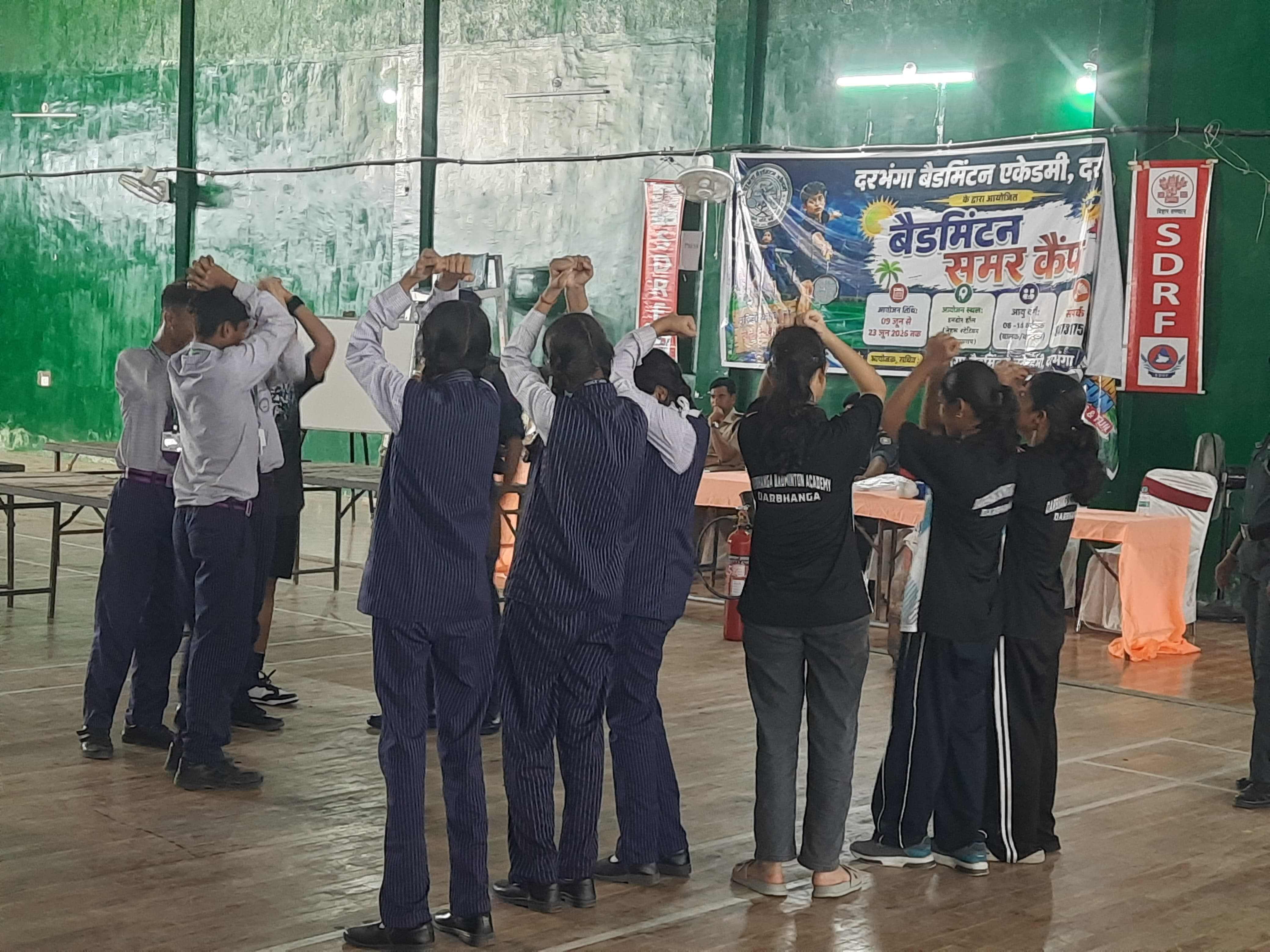 Students practising an earthquake safety drill